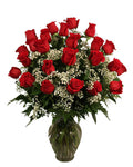 Bouquet of red roses with a clear vase